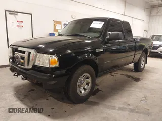 2009 Ford Ranger XLT with VIN 1FTZR45E79PA63934, listed as a IAAI auction lot 41441326 with 153,140 mi miles. Bid and sale history available at carsss.com. Image 2.