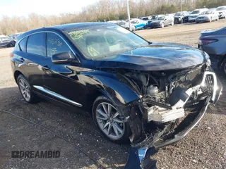 2019 Acura RDX w/Technology Pkg with VIN 5J8TC2H52KL010287, listed as a IAAI auction lot 41621364 with 82,935 mi miles. Bid and sale history available at carsss.com. Image 1.