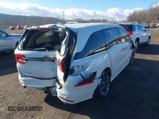 2024 Honda Odyssey Elite with VIN 5FNRL6H90RB028139, listed as a IAAI auction lot 41666330 with 8,516 mi miles and . Bid and sale history available at DreamBid. Image 4.
