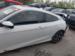 2018 Honda Civic Si z VIN 2HGFC3A59JH756468, wystawiony jako IAAI lot #42220690 z przebiegiem 80 526 mil mil oraz . Historia ofert i sprzedaży dostępna na DreamBid. Obrazek 14.