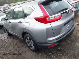 2018 Honda CR-V LX with VIN 2HKRW5H35JH401453, listed as a IAAI auction lot 41931225 with 106,854 mi miles and . Bid and sale history available at carsss.com. Image 3.