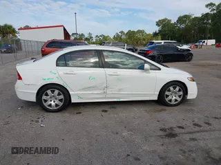 2010 Honda Civic LX with VIN 2HGFA1F54AH533810, listed as a IAAI auction lot 42171253 with 211,551 mi miles and . Bid and sale history available at DreamBid. Image 13.