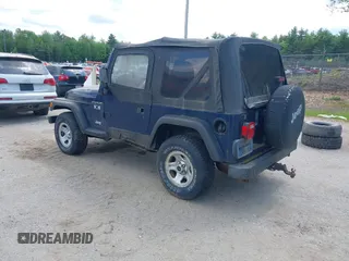 2002 Jeep Wrangler X z VIN 1J4FA39S82P735794, wystawiony jako IAAI lot #42411386 z przebiegiem 141 219 mil mil oraz . Historia ofert i sprzedaży dostępna na DreamBid. Obrazek 3.