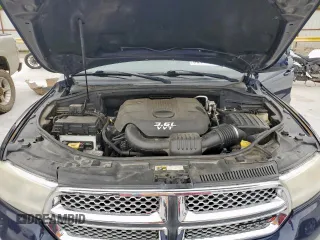 2013 Dodge Durango SXT z VIN 1C4RDHAG4DC685467, wystawiony jako Copart lot #60140355 z przebiegiem 173 752 mil mil oraz Czysty tytuł • Clean title. Historia ofert i sprzedaży dostępna na DreamBid. Obrazek 12.