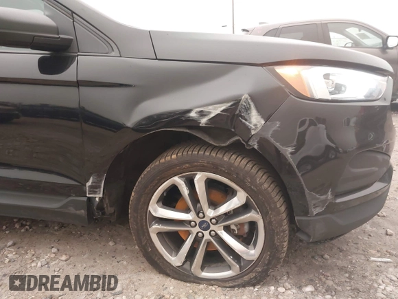 2019 Ford Edge SE with VIN 2FMPK4G97KBB82717, listed as a IAAI auction lot 42385647 with 102,616 mi miles and . Bid and sale history available at DreamBid. Image 6.