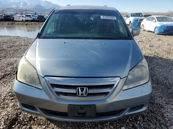 2007 Honda Odyssey EX-L with VIN 5FNRL38647B023186, listed as a Copart auction lot 87697035 with 190,884 mi miles and Salvage Title. Bid and sale history available at carsss.com. Image 5.