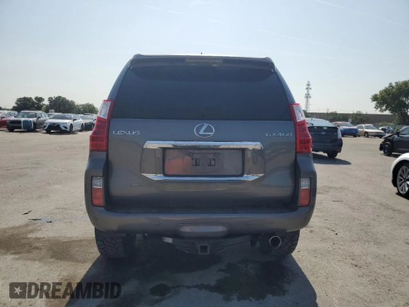 2010 Lexus GX 460 Premium with VIN JTJJM7FX5A5011762, listed as a Copart auction lot 56207715 with 185,360 mi miles and Salvage title. Bid and sale history available at DreamBid. Image 6.
