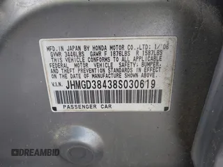 2008 Honda Fit with VIN JHMGD38438S030619, listed as a IAAI auction lot 42010052 with 147,588 mi miles. Bid and sale history available at carsss.com. Image 9.