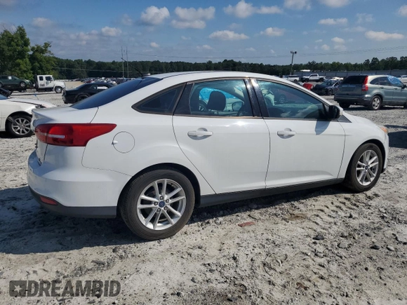 2015 Ford Focus SE with VIN 1FADP3F22FL218056, listed as a Copart auction lot 63093805 with 145,824 mi miles and Clean title. Bid and sale history available at DreamBid. Image 3.
