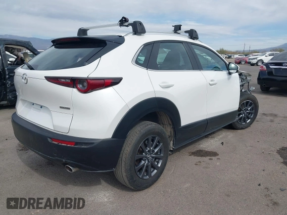 2021 Mazda CX-30 2.5 S with VIN 3MVDMAAL8MM226728, listed as a IAAI auction lot 41492548 with 56,826 mi miles. Bid and sale history available at carsss.com. Image 4.