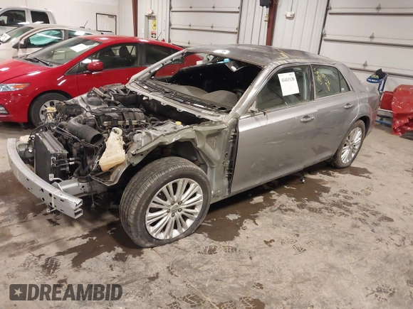 2013 Chrysler 300 with VIN 2C3CCAKT9DH581098, listed as a IAAI auction lot 41411138 with 104,732 mi miles. Bid and sale history available at carsss.com. Image 2.