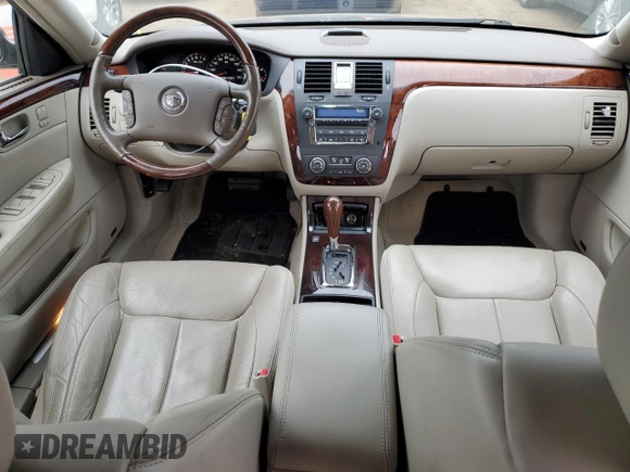 2006 Cadillac DTS 1SE with VIN 1G6KD57946U227808, listed as a Copart auction lot 85158324 with 82,180 mi miles and Salvage Title. Bid and sale history available at DreamBid. Image 8.
