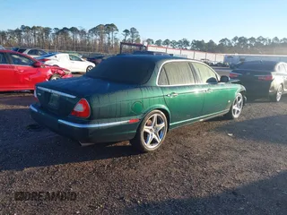 2007 Jaguar XJ VDP with VIN SAJWA82C37TH14330, listed as a IAAI auction lot 41316658 with 59,745 mi miles. Bid and sale history available at carsss.com. Image 4.