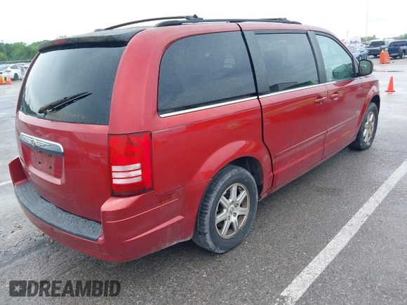 2008 Chrysler Town & Country Touring with VIN 2A8HR54PX8R731719, listed as a IAAI auction lot 42220977 with 128,977 mi miles and . Bid and sale history available at DreamBid. Image 4.