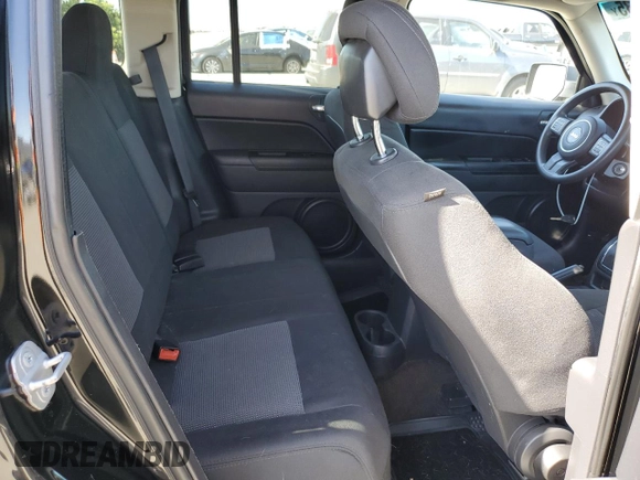 2014 Jeep Patriot Altitude with VIN 1C4NJPBA3ED758528, listed as a Copart auction lot 58076435 with 252,479 mi miles and Clean title. Bid and sale history available at DreamBid. Image 11.