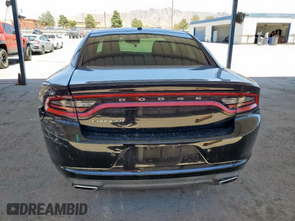 2015 Dodge Charger SE z VIN 2C3CDXBGXFH716742, wystawiony jako Copart lot #60039165 z przebiegiem 153 278 mil mil oraz Szkoda całkowita • Salvage title. Historia ofert i sprzedaży dostępna na DreamBid. Obrazek 6.