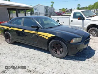 2012 Dodge Charger Police z VIN 2C3CDXAGXCH262845, wystawiony jako IAAI lot #42134517 z przebiegiem 99 229 mil mil oraz . Historia ofert i sprzedaży dostępna na DreamBid. Obrazek 1.