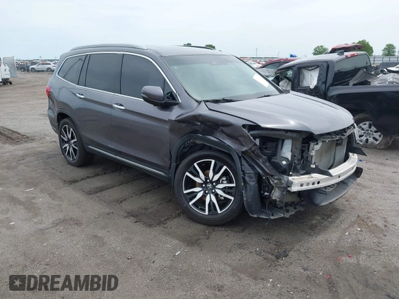 2019 Honda Pilot Touring 8-Passenger with VIN 5FNYF5H93KB028641, listed as a IAAI auction lot 42524078 with 56,744 mi miles and . Bid and sale history available at DreamBid. Image 1.