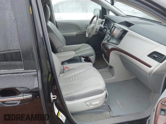 2012 Toyota Sienna XLE with VIN 5TDDK3DC3CS030466, listed as a IAAI auction lot 41914368 with 174,512 mi miles. Bid and sale history available at carsss.com. Image 5.