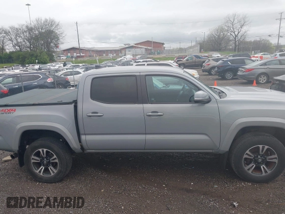 2019 Toyota Tacoma SR z VIN 3TMCZ5AN1KM206969, wystawiony jako IAAI lot #41951159 z przebiegiem 94 875 mil mil oraz . Historia ofert i sprzedaży dostępna na DreamBid. Obrazek 13.