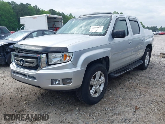 2009 Honda Ridgeline RTL with VIN 2HJYK16539H500986, listed as a IAAI auction lot 42084176 with 161,142 mi miles and . Bid and sale history available at DreamBid. Image 20.