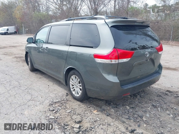 2012 Toyota Sienna XLE AAS with VIN 5TDYK3DC1CS199113, listed as a IAAI auction lot 42123757 with 211,723 mi miles and . Bid and sale history available at carsss.com. Image 3.
