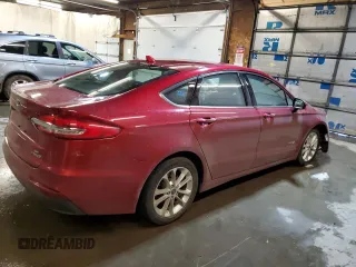 2019 Ford Fusion Hybrid SE with VIN 3FA6P0LU0KR220591, listed as a Copart auction lot 73487712 with 102,599 mi miles. Bid and sale history available at carsss.com. Image 3.