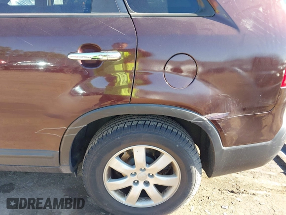 2013 Kia Sorento LX with VIN 5XYKT3A17DG375103, listed as a IAAI auction lot 42327291 with 228,761 mi miles and . Bid and sale history available at DreamBid. Image 6.