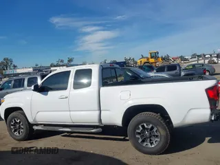 2018 Toyota Tacoma SR with VIN 5TFRX5GN9JX106232, listed as a IAAI auction lot 41634120 with 66,674 mi miles and . Bid and sale history available at DreamBid. Image 14.