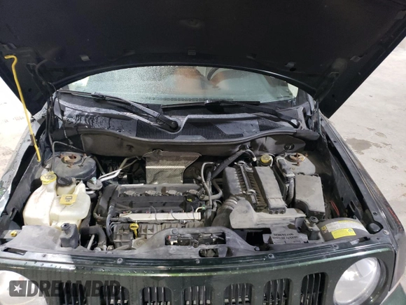2010 Jeep Patriot Latitude z VIN 1J4NT1GAXAD625804, wystawiony jako Copart lot #89325875 z przebiegiem 66 202 mil mil oraz Szkoda całkowita • Salvage title. Historia ofert i sprzedaży dostępna na DreamBid. Obrazek 12.