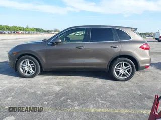 2011 Porsche Cayenne S Hybrid with VIN WP1AE2A29BLA94414, listed as a IAAI auction lot 41644386 with 76,095 mi miles. Bid and sale history available at carsss.com. Image 14.