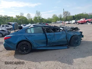 2025 Toyota Camry LE z VIN 4T1DAACK5SU506058, wystawiony jako IAAI lot #42147137 z przebiegiem Nie podano mil oraz . Historia ofert i sprzedaży dostępna na DreamBid. Obrazek 12.