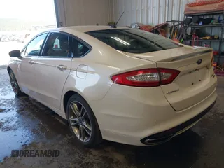 2016 Ford Fusion Titanium z VIN 3FA6P0D93GR116355, wystawiony jako IAAI lot #42158991 z przebiegiem 59 602 mil mil oraz . Historia ofert i sprzedaży dostępna na DreamBid. Obrazek 3.