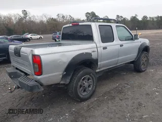 2001 Nissan Frontier SE z VIN 1N6ED27T91C318489, wystawiony jako IAAI lot #41441798 z przebiegiem 214 834 mil mil oraz . Historia ofert i sprzedaży dostępna na DreamBid. Obrazek 4.