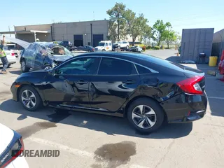 2019 Honda Civic Sedan LX with VIN 19XFC2F61KE202252, listed as a IAAI auction lot 42139362 with 37,128 mi miles. Bid and sale history available at carsss.com. Image 14.