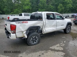 2017 Toyota Tacoma SR5 z VIN 5TFCZ5AN1HX113842, wystawiony jako Copart lot #60711285 z przebiegiem 124 799 mil mil oraz Szkoda całkowita • Salvage title. Historia ofert i sprzedaży dostępna na DreamBid. Obrazek 3.