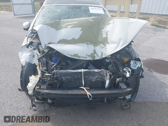 2012 Volkswagen Eos Komfort with VIN WVWBW7AH9CV017620, listed as a IAAI auction lot 40945479 with 96,444 mi miles and . Bid and sale history available at DreamBid. Image 6.