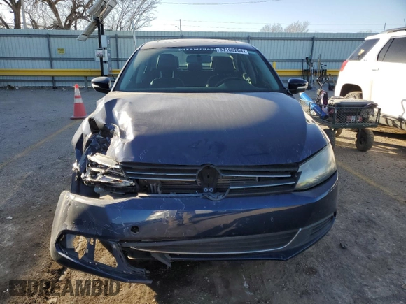 2013 Volkswagen Jetta SE with VIN 3VWDX7AJ6DM422416, listed as a Copart auction lot 87160204 with 138,429 mi miles and Salvage title. Bid and sale history available at DreamBid. Image 5.