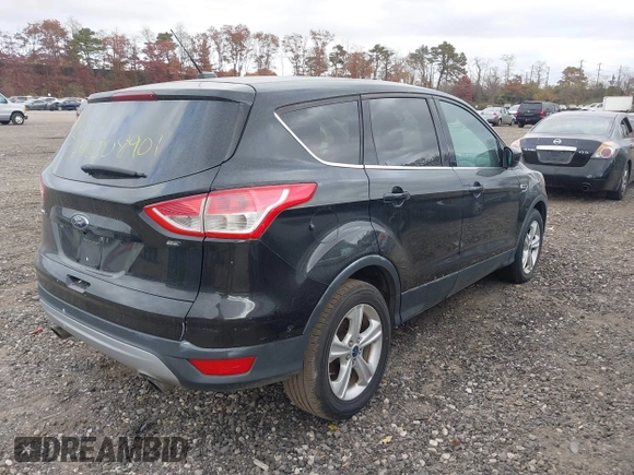2015 Ford Escape SE with VIN 1FMCU0GXXFUA40927, listed as a IAAI auction lot 40735395 with Not Provided miles. Bid and sale history available at carsss.com. Image 4.