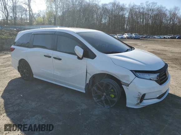 2021 Honda Odyssey EX-L with VIN 5FNRL6H78MB019258, listed as a Copart auction lot 52496285 with 33,734 mi miles and Salvage Title. Bid and sale history available at DreamBid. Image 4.