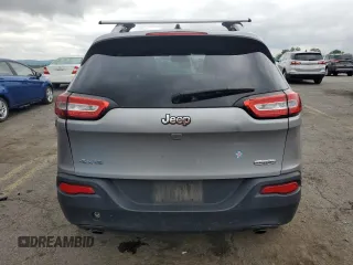 2014 Jeep Cherokee Latitude z VIN 1C4PJMCS8EW286152, wystawiony jako Copart lot #60332475 z przebiegiem 102 434 mil mil oraz Szkoda całkowita • Salvage title. Historia ofert i sprzedaży dostępna na DreamBid. Obrazek 6.