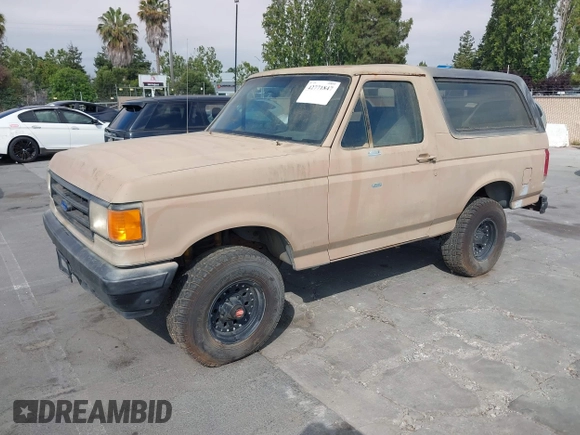 1988 Ford Bronco Eddie Bauer with VIN 1FMEU15N3JLA98943, listed as a IAAI auction lot 42771847 with 41,662 mi miles and . Bid and sale history available at DreamBid. Image 2.