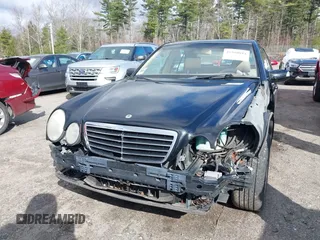 2000 Mercedes-Benz E-Class with VIN WDBJF82J2YX037818, listed as a IAAI auction lot 41910044 with 163,240 mi miles. Bid and sale history available at carsss.com. Image 6.