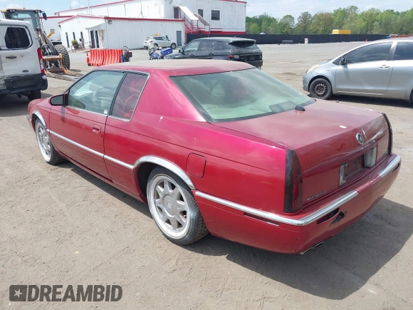 1997 Cadillac Eldorado Touring ETC z VIN 1G6ET1297VU600449, wystawiony jako IAAI lot #42096992 z przebiegiem 185 918 mil mil oraz . Historia ofert i sprzedaży dostępna na DreamBid. Obrazek 3.