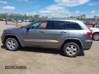 2011 Jeep Grand Cherokee Laredo with VIN 1J4RR4GGXBC587911, listed as a IAAI auction lot 42156885 with 178,999 mi miles and . Bid and sale history available at DreamBid. Image 14.
