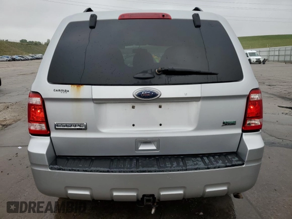 2011 Ford Escape XLT с VIN 1FMCU9DG8BKC62302, выставлен на аукционе Copart как лот 58240715 с пробегом 159 739 миль миль и Списание • Salvage title. История ставок и продаж доступна на DreamBid. Изображение 6.