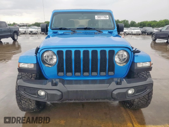 2023 Jeep Wrangler Sahara with VIN 1C4HJXEG7PW590252, listed as a Copart auction lot 59377765 with 32,689 mi miles and Salvage title. Bid and sale history available at DreamBid. Image 5.