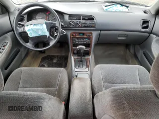 1997 Honda Accord Special Edition с VIN 1HGCD5607VA271467, выставлен на аукционе Copart как лот 60099185 с пробегом 132 729 миль миль и На запчасти • Non repairable. История ставок и продаж доступна на DreamBid. Изображение 8.