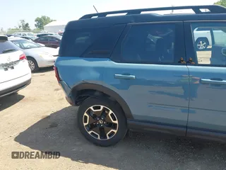 2023 Ford Bronco Sport Outer Banks z VIN 3FMCR9C66PRD01823, wystawiony jako IAAI lot #42817684 z przebiegiem 19 881 mil mil oraz . Historia ofert i sprzedaży dostępna na DreamBid. Obrazek 6.
