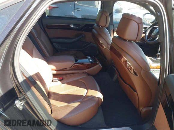 2013 Audi A8 3.0L with VIN WAURGAFD0DN005532, listed as a IAAI auction lot 42113540 with 176,635 mi miles and . Bid and sale history available at DreamBid. Image 8.